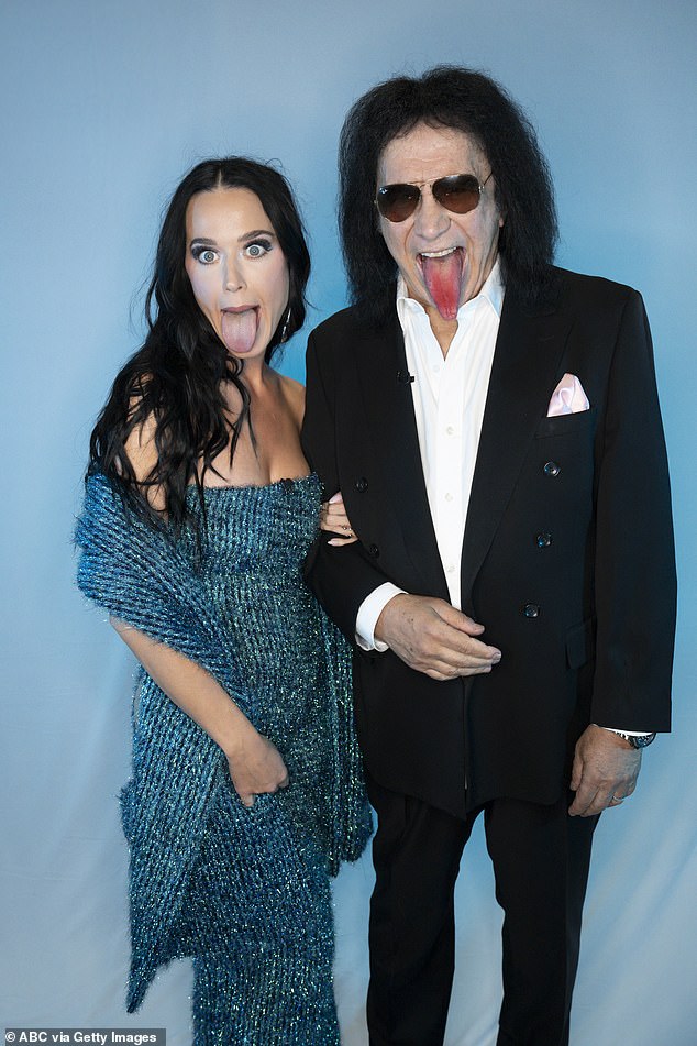 Katy Perry, 39, had a bit of fun as she playfully stuck out her tongue with KISS legend, Gene Simmons, 74, on set of American Idol on Sunday